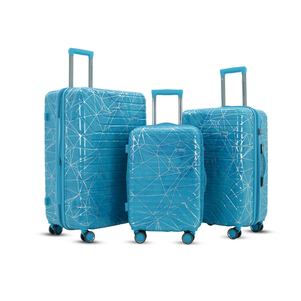 Designer hard shell suitcase set of 3 in glossy blue with modern geometric pattern and 360-degree spinner wheels