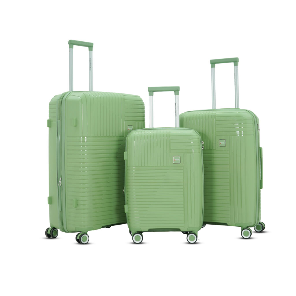Set of three green hard luggage trolley bags with textured finish and 360° spinner wheels