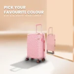 Pink Goldie Suitcase in front of Mirror by American Traveller Trolley Bag in India