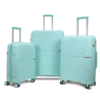 Three mint green luggage bags of varying sizes stand upright, featuring wheels and handles, ready for travel adventures.